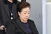 Han Hak-ja, leader of the Unification Church, leaves the Seoul Central District Court on Sept. 22 after attending a hearing to review her arrest warrant. [YONHAP]