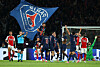 Paris Saint-Germain, in navy blue, celebrate after beating Arsenal 2-1 in the second leg of the Champions League semifinals at Parc des Princes in Paris on May 7. [REUTERS/YONHAP]