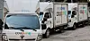 Coupang delivery trucks are parked in Seoul on May 7. [YONHAP]
