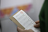 A voter is seen holding their ballot at an early voting station in Yeoksam-dong in southern Seoul on May 30, the second day of early voting for the 21st presidential election. [JOONGANG ILBO]