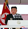 North Korean leader Kim Jong-un speaks during a launch ceremony on June 12 at the Najin Shipyard for a newly built navy destroyer, which has been named Kang Kon, according to a report by the state-run Korean Central News Agency on June 13. [YONHAP]