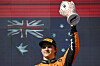 Second placed McLaren driver Oscar Piastri of Australia holds up his trophy on the podium after the Formula One Hungarian Grand Prix at the Hungaroring circuit in Mogyorod, Hungary, on Aug. 3. [EPA/YONHAP]