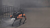 A four-legged robot walks through smoke during a demonstration at the Seoul Metropolitan Fire Academy in Eunpyeong District, northern Seoul, on Feb. 26. [CHO JUNG-WOO]