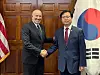 Trade Minister Yeo Han-koo, right, shakes hands with U.S. Commerce Secretary Howard Lutnick after a meeting on tariffs in Washington on July 7. [MINISTRY OF TRADE, INDUSTRY AND ENERGY]
