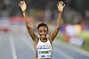 Beatrice Chebet, of Kenya, celebrates after crossing the finish line to win the women 5000 meters at the Diamond League Golden Gala Pietro Mennea athletics meet at the Stadio Olimpico in Rome, Friday, June 6, 2025. [AP/YONHAP]