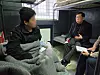 Rep. Yoo Yong-won of the People Power Party, right, on March 4 released this photo taken during his meeting with North Korean soldiers captured by Ukrainian forces. [YONHAP]