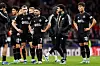 Celtic players, including Korean midfielders Oh Hyeon-gyu, right, and Yang Hyun-jun, left, react to their defeat at the end of a UEFA Champions League group E match against Celtic at the Metropolitano Stadium in Madrid on Tuesday. [AFP/YONHAP]