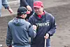 LG Twins manager Yeom Kyoung-youb, left, and KIA manager Lee Bum-ho greet each other before the LG Twins and KIA Tigers practice game held at Kin Baseball Stadium in Okinawa, Japan on Feb. 27. [NEWS1]