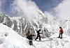 Mountaineers practice walking on a ladder during a training session at Everest base camp, Nepal, on April 15. [REUTERS/YONHAP]