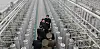 North Korean leader Kim Jong-un, second from top, inspects a nuclear material production base in a photo published by the Korean Central News Agency on Jan. 29. [YONHAP]