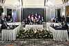 Malaysia's Prime Minister Anwar Ibrahim, center, looks on as Cambodia's Prime Minister Hun Manet, left, and Thailand's acting Prime Minister Phumtham Wechayachai, right, take part in talks on a possible ceasefire between Thailand and Cambodia, in Putrajaya on July 28. [AP/YONHAP]