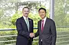 In this photo taken May 16 and provided by HD Hyundai, Chung Ki-sun, right, executive vice chairman and CEO of the group, shakes hands with U.S. Trade Rep. Jamieson Greer ahead of a meeting to discuss shipbuilding cooperation at the Asia-Pacific Economic Cooperation trade ministers' meeting that runs in Jeju from May 15 to 16. [YONHAP]