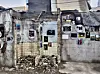 Photography are being displayed around the alleys of Euljiro for a pop-up show hosted by the Moving Gallery Project on Nov. 25. [LEE JIAN]