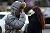 Pedestrians try to keep themselves warm with outerwear and jackets on Tuesday morning in Jongno District, central Seoul. [NEWS1]