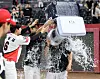 Teammates douse Kia Tigers' Yang Hyeong-jong with water after the game against the Lotte Giants Wednesday when he set the new all-time strikeout record. [YONHAP]