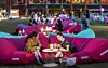 Foreign tourists read books while relaxing in colorful beanbags during the Seoul Outdoor Library event in front of City Hall in central Seoul on Sept. 22. [SEOUL METROPOLITAN GOVERNMENT]