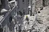 Israeli soldiers dig through rubble to search for survivors in a residential area hit by a missile fired from Iran near Tel Aviv, Israel, on June 15. [AP/YONHAP]