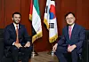 The U.A.E. Ambassador to Korea Abdulla Saif Al Nuaimi, left, and the People Power Party Rep. Lee Myoung-su, right, who heads the Korea-U.A.E. parliamentary association, discuss latest events in the U.A.E-Korea ties at the embassy in Seoul on Sept. 10. [PARK SANG-MOON]