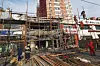 In this photo released by Xinhua News Agency, workers build a scaffolding around the site of a restaurant fire in Liaoyang in northeastern China on April 29. [AP/YONHAP]
