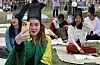 Foreign tourists take the gwageo, or state examinations, to become government officials during the Joseon Dynasty (1392-1910), at the 26th UN Peace Festival in Busan on Oct. 20. [JOONGANG ILBO]