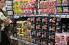 Buldak Bokkeummyeon products are displayed at a supermarket. [YONHAP]