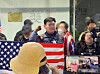 A man wearing Captain America's iconic costume shows up at the National Human Rights Commission of Korea's building in Jung District, central Seoul, on Feb. 10. [YONHAP]