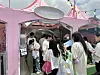 Beauty enthusiasts line up in front of booths to get samples at the 2025 Olive Young Festa on May 21. [OLIVE YOUNG]