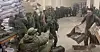 Soldiers believed to be from North Korea are standing in line to receive supplies from Russia on Oct. 19 in a screen capture of video footage released by the Ukrainian Center for Strategic Communication and Information Security, or Spravdi, Friday, on Facebook. [SCREEN CAPTURE]