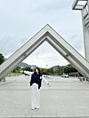 Josephine Elysia Linfred poses for a photo in front of Seoul National University's main gate. [JOSEPHINE ELYSIA LINFRED]