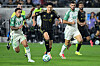 Los Angeles forward Son Heung-min, center, battles for the ball during Game 1 of the first round of MLS's Western Conference playoffs in Los Angeles, California, on Oct. 29. [AP/YONHAP]