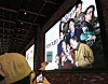 A moviegoer takes a photo of their ticket with a ″No Other Choice″ poster in the background at a Seoul cinema on Sept. 25. [YONHAP]