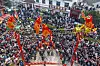 People watch artists perform an acrobatic lion dance during the Chinese New Year celebrations at a village in Yuxiang Town in Yongji City, north China's Shanxi Province, on Jan. 29, in this photo released by Xinhua News Agency. [AP/YONHAP]