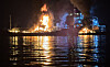 A fire broke out aboard a large oil products tanker and a smaller cargo vessel in Yeosu, South Jeolla, on Aug. 16, leaving one dead and two injured. [KOREA COAST GUARD]