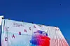 Workers set up a giant canvas of one of the official double poster featuring a joint tribute to the two actors Anouk Aimee and Jean-Louis Trintignant in the film ″A Man and a Woman″ on the Festival Palace ahead of the opening ceremony of the 78th Cannes Film Festival in Cannes, France, May 11. [REUTERS/YONHAP]