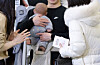 Visitors at a fair for baby products try on child care items at Coex in Gangnam District, southern Seoul, on Jan. 15. [NEWS1]