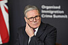 Britain's Prime Minister Keir Starmer leads a roundtable discussion at the Border Security Summit in London, March 31. [AP/YONHAP]