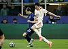 Bayern Munich defender Kim Min-jae, right, vies for the ball during the second leg of the Champions League quarterfinals at San Siro Stadium in Milan, Italy on April 16. [REUTERS/YONHAP]