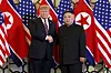President Donald Trump, left, poses with North Korean leader Kim Jong-un in Hanoi, Vietnam, on Feb. 27, 2019. [AP/YONHAP]