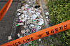 Residue from trash-laden balloons are seen scattered around a park near the National Assembly building in Yeouido, western Seoul, on Thursday. [NEWS1]