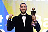 Cody Ponce of the Hanwha Eagles poses with the trophy after winning the KBO regular-season MVP award during an awards ceremony at Lotte Hotel World in Seoul on Nov. 24. [NEWS1]