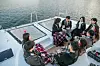 Participants in Seoul's mass blind date event chat during a yacht tour on the Han River on Saturday. [SEOUL METROPOLITAN GOVERNMENT]