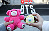 BTS fans take a picture of their stuffed animals at a special installation promoting the band's upcoming album on the stairs of the Sejong Center for the Performing Arts in Jongno District, central Seoul, on Jan. 22. [NEWS1]