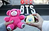 BTS fans take a picture of their stuffed animals at a special installation promoting the band's upcoming album on the stairs of the Sejong Center for the Performing Arts in Jongno District, central Seoul, on Jan. 22. [NEWS1]