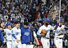 Samsung Lions players celebrate their 5-2 win over the SSG Landers in Game 4 of the first-round series in the KBO postseason at Daegu Samsung Lions Park in the southeastern city of Daegu on Oct. 14. [YONHAP]