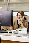 Krystyna Zheludkova gives a phone consultation as part of her work at Seoul Global Center. [KRYSTYNA ZHELUDKOVA]