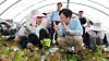 Labor Minister Kim Young-hoon listens to foreign workers during a visit with Democratic Party Rep. An Ho-young, chair of the National Assembly’s Environment and Labor Committee, to a farm employing foreign laborers in Wanju County, North Jeolla, on Aug. 8. [MINISTRY OF EMPLOYMENT AND LABOR]
