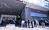 People line up outside a SK Telecom store in Seoul to switch out their USIM cards on April 28. [YONHAP]