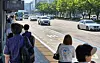Commuters wait at a bus stop outside Gwangju's main bus terminal in Seo District on June 5, as the city's bus union begins a general strike. [JOONGANG ILBO]