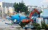 A crane is tears down Sampyo Remicon's Seoul factory in its final phase of demolition in August 2022. [YONHAP]