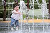 A child cools off at a fountain in Suchang Park in Jung District, Daegu, on May 20, as temperatures soared past 30 degrees Celsius. [NEWS1]